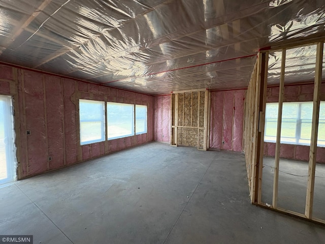 820 Morrison Ave S, Annandale, MN 55302 - unfurnished room featuring unfinished concrete flooring