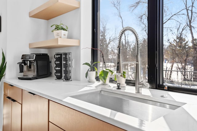 16216 Gleason Lake Rd, Minnetonka, MN 55391 - kitchen view of a sink, open shelves, and light countertops