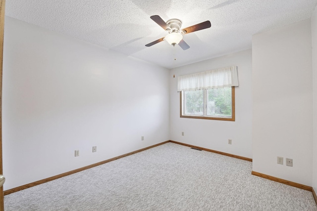 1378 Dunsmore Dr, Waconia, MN 55387 - carpeted empty room featuring a ceiling fan, baseboards, and a textured ceiling