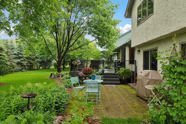 1378 Dunsmore Dr, Waconia, MN 55387 - view of green lawn featuring a deck