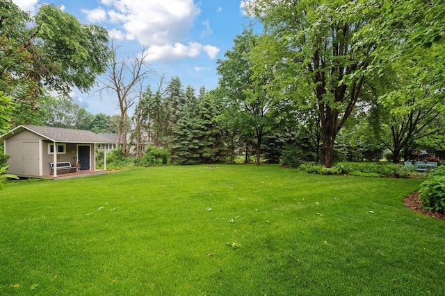 1378 Dunsmore Dr, Waconia, MN 55387 - view of grassy yard with an outdoor structure