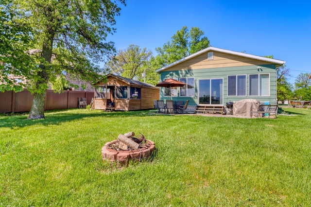 25934 Brolin Beach Rd, Detroit Twp, MN 56501 - back of house featuring an outbuilding