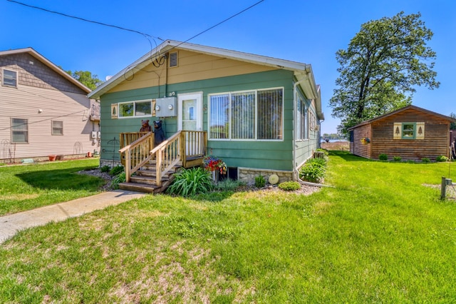 25934 Brolin Beach Rd, Detroit Twp, MN 56501 - shotgun-style home with a front lawn