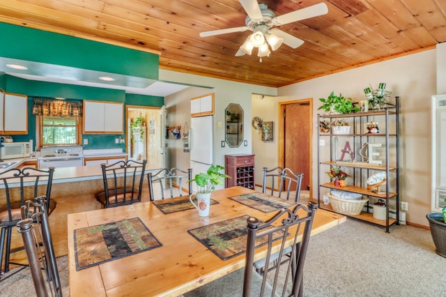 25934 Brolin Beach Rd, Detroit Twp, MN 56501 - dining room with wood ceiling, ceiling fan, and carpet floors