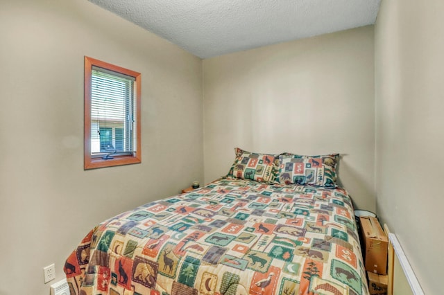 25934 Brolin Beach Rd, Detroit Twp, MN 56501 - bedroom with a textured ceiling
