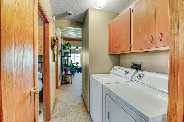 25934 Brolin Beach Rd, Detroit Twp, MN 56501 - laundry room featuring cabinet space, separate washer and dryer, light colored carpet, and a textured ceiling