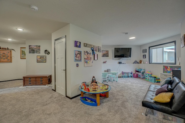 17690 Clayton Ave E, Vermillion Twp, MN 55068 - recreation room featuring carpet floors, recessed lighting, and a textured ceiling
