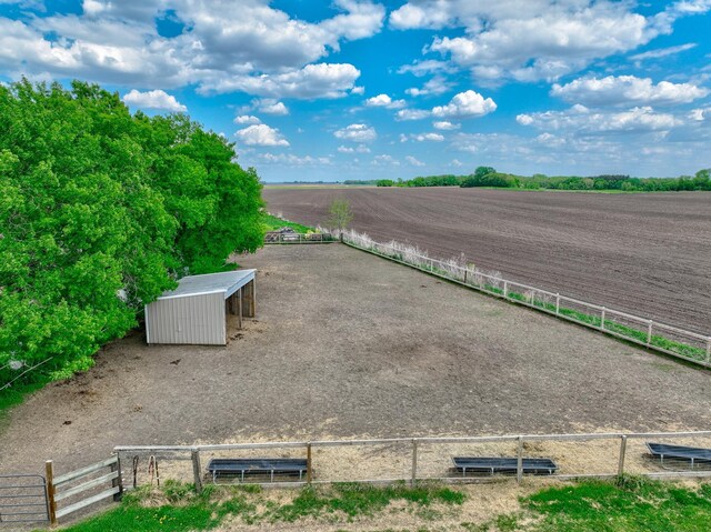 17690 Clayton Ave E, Vermillion Twp, MN 55068 - view of patio with a view of countryside and an outbuilding