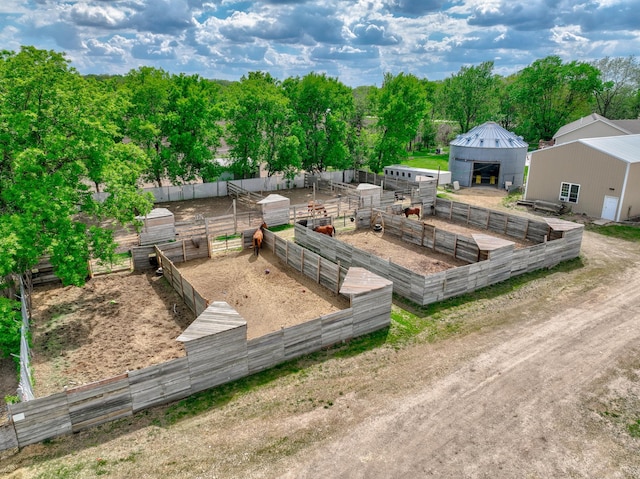 17690 Clayton Ave E, Vermillion Twp, MN 55068 - wooden terrace featuring an exterior structure and an outbuilding