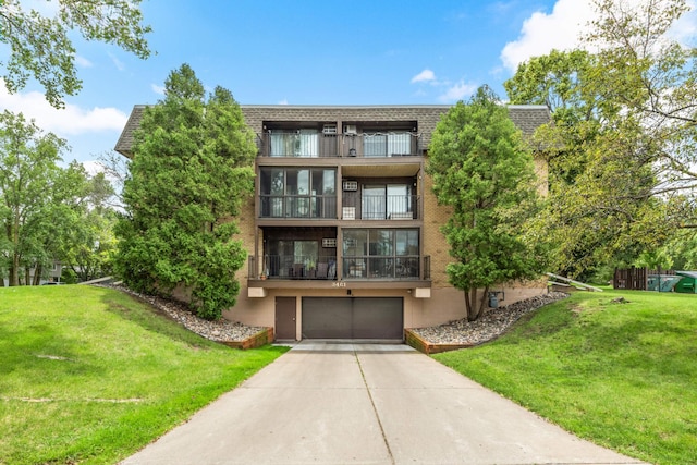 3461 Kent St Unit 1104, Shoreview, MN 55126 - view of property with driveway and an attached garage