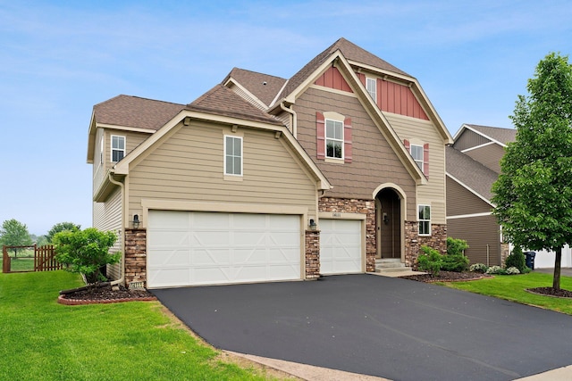 14111 Abercorn Ave, Rosemount, MN 55068 - craftsman inspired home featuring an attached garage, board and batten siding, asphalt driveway, stone siding, and roof with shingles