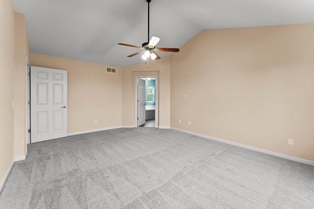 14111 Abercorn Ave, Rosemount, MN 55068 - spare room with a ceiling fan, carpet flooring, lofted ceiling, and baseboards