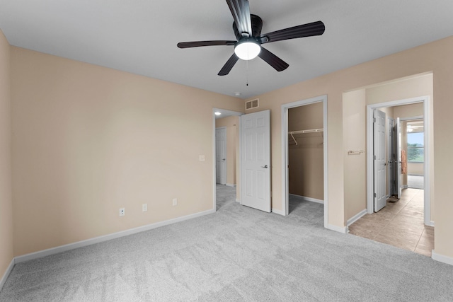 14111 Abercorn Ave, Rosemount, MN 55068 - unfurnished bedroom featuring carpet floors, baseboards, a spacious closet, and a closet