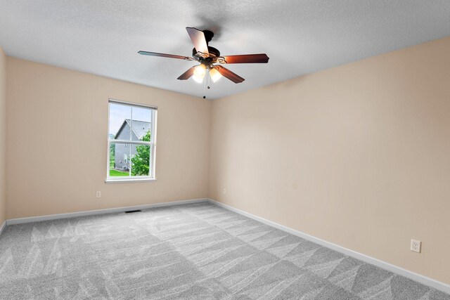 14111 Abercorn Ave, Rosemount, MN 55068 - carpeted spare room with a ceiling fan and baseboards