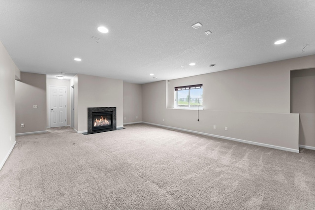 14111 Abercorn Ave, Rosemount, MN 55068 - unfurnished living room featuring carpet floors, recessed lighting, baseboards, a high end fireplace, and a textured ceiling