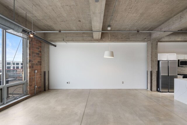 901 3rd St Unit 515, Minneapolis, MN 55401 - garage with freestanding refrigerator and baseboards