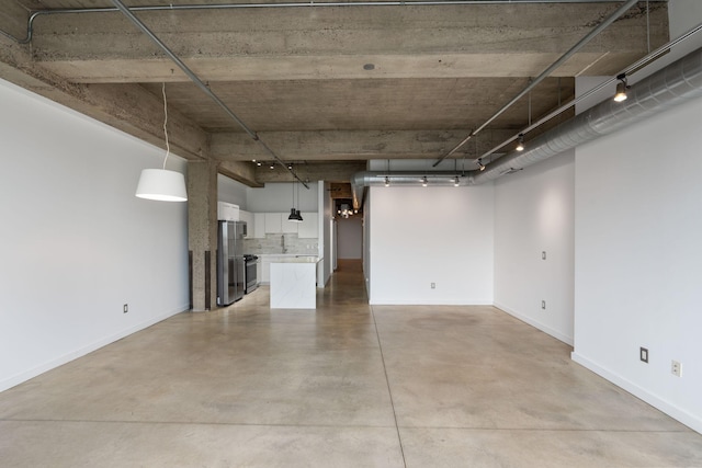901 3rd St Unit 515, Minneapolis, MN 55401 - basement featuring freestanding refrigerator and baseboards