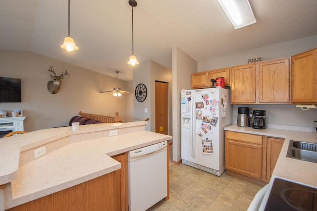 1810 41st Ave S, Moorhead, MN 56560 - kitchen with white appliances, open floor plan, lofted ceiling, light countertops, and pendant lighting