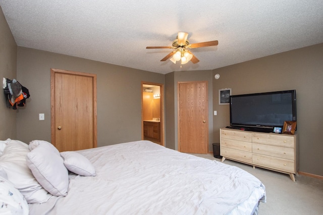 1810 41st Ave S, Moorhead, MN 56560 - bedroom featuring light carpet, a ceiling fan, and ensuite bathroom