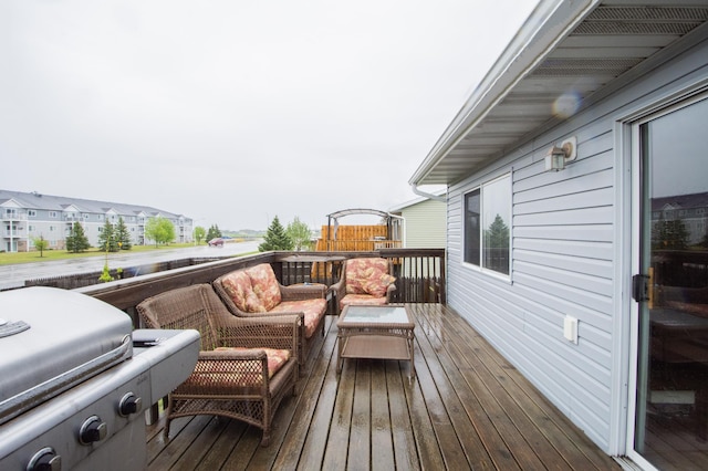 1810 41st Ave S, Moorhead, MN 56560 - deck with an outdoor hangout area and area for grilling