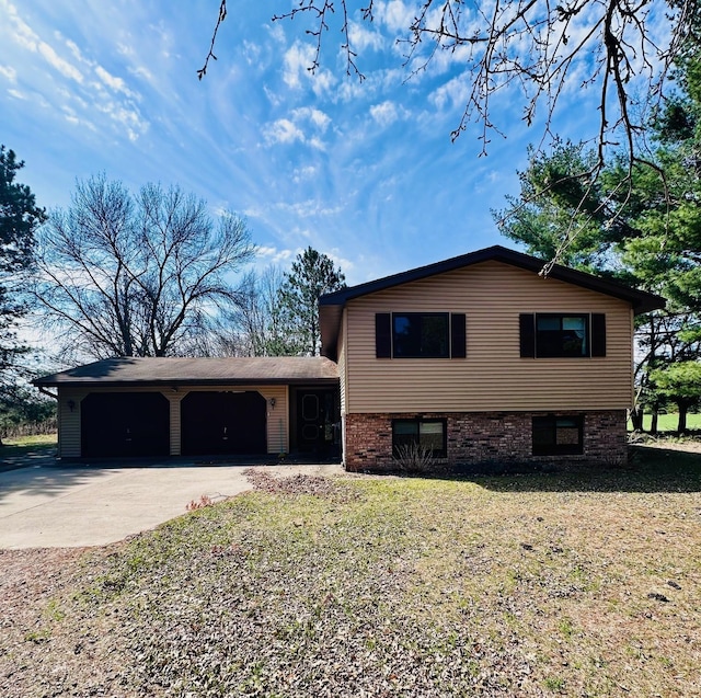 10605 297th Ave, Princeton, MN 55371 - view of side of property with an attached garage, driveway, and a yard