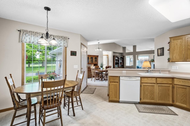 12 3rd St NW, Saint Michael, MN 55376 - kitchen with dishwasher, a chandelier, a peninsula, plenty of natural light, and lofted ceiling