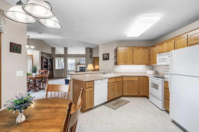 12 3rd St NW, Saint Michael, MN 55376 - kitchen with white appliances, a peninsula, light countertops, open floor plan, and lofted ceiling
