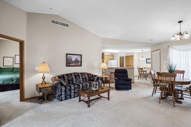 12 3rd St NW, Saint Michael, MN 55376 - living area featuring lofted ceiling, light colored carpet, and a chandelier