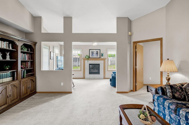 12 3rd St NW, Saint Michael, MN 55376 - living area featuring light colored carpet and a tiled fireplace