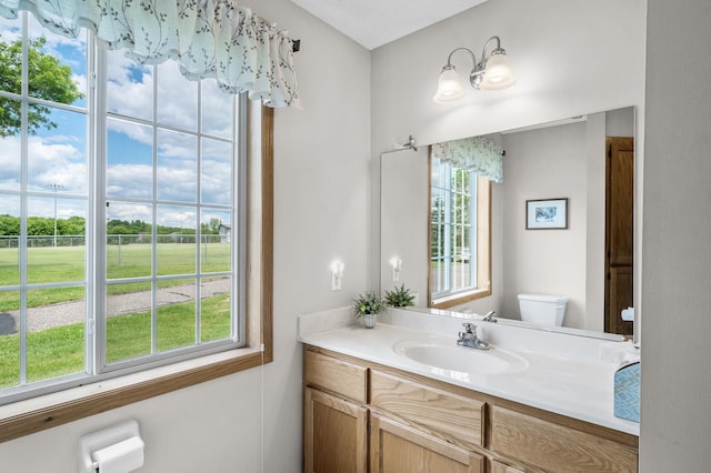 12 3rd St NW, Saint Michael, MN 55376 - bathroom featuring vanity and toilet
