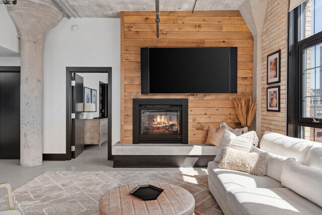 525 3rd St N Unit 511, Minneapolis, MN 55401 - living area with finished concrete floors and a fireplace