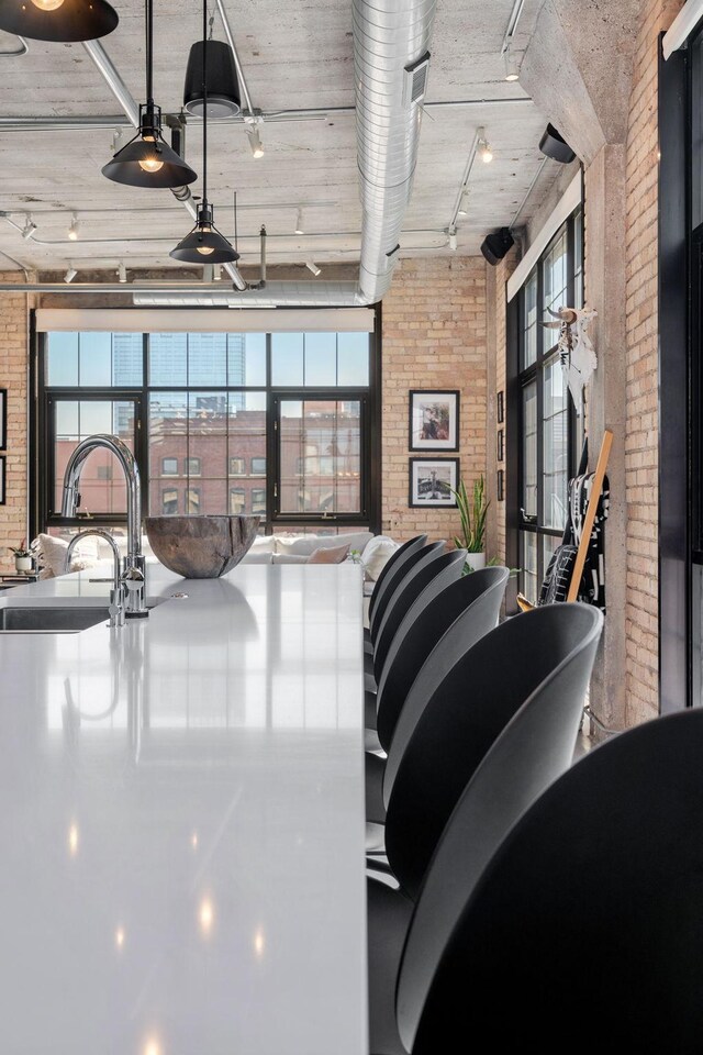 525 3rd St N Unit 511, Minneapolis, MN 55401 - community lobby featuring brick wall and a sink