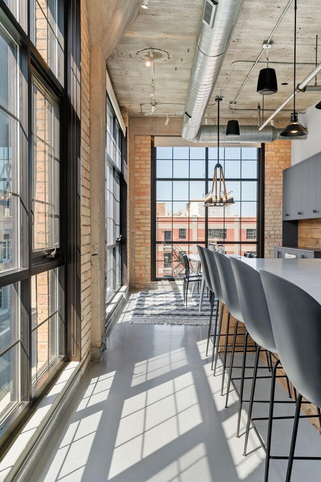 525 3rd St N Unit 511, Minneapolis, MN 55401 - interior space with brick wall and a chandelier