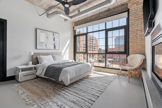 525 3rd St N Unit 511, Minneapolis, MN 55401 - bedroom featuring finished concrete floors and multiple windows