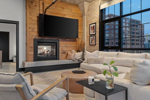 525 3rd St N Unit 511, Minneapolis, MN 55401 - living room with a multi sided fireplace and wood walls