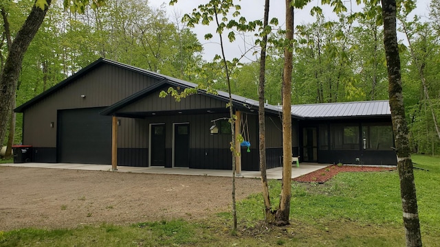 21313 Evening Star Ln, Emily, MN 56662 - back of house with a sunroom and a yard