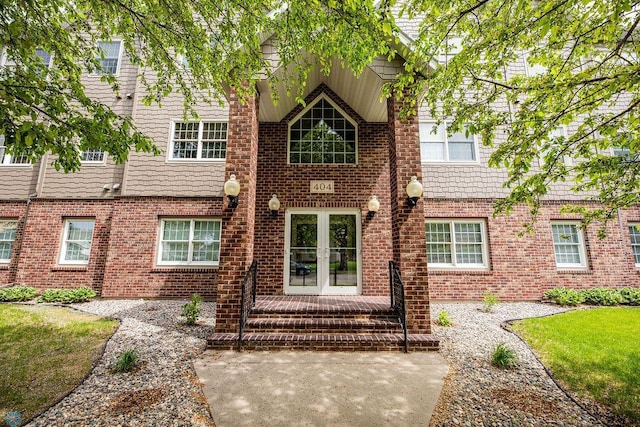 404 8th St S Unit 303, Fargo, ND 58103 - view of front of home with french doors and brick siding