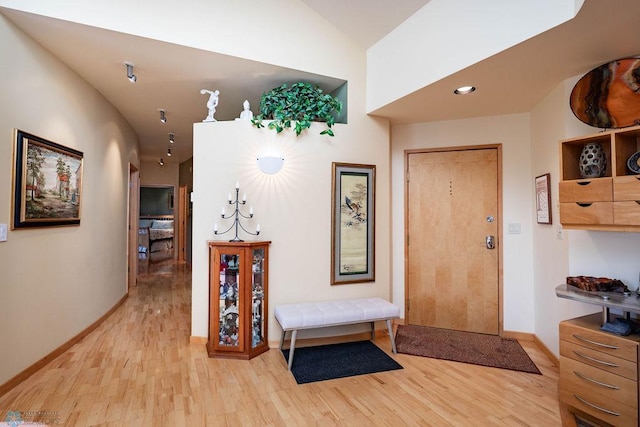 404 8th St S Unit 303, Fargo, ND 58103 - foyer entrance featuring light wood-style floors and baseboards