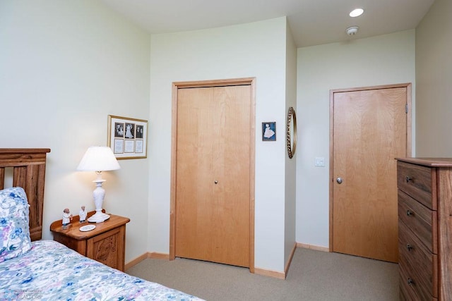 404 8th St S Unit 303, Fargo, ND 58103 - carpeted bedroom with baseboards and a closet