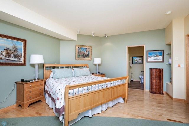 404 8th St S Unit 303, Fargo, ND 58103 - bedroom with light wood-style flooring