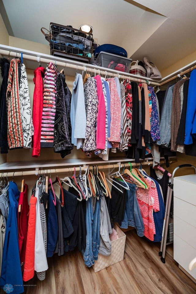 404 8th St S Unit 303, Fargo, ND 58103 - walk in closet featuring wood finished floors