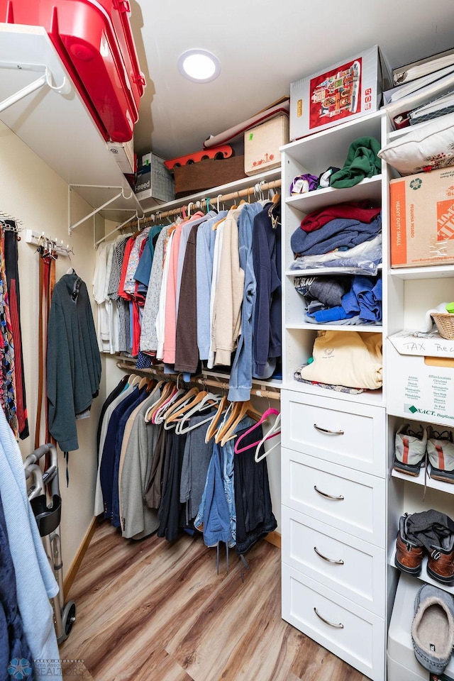 404 8th St S Unit 303, Fargo, ND 58103 - walk in closet featuring light wood-style floors