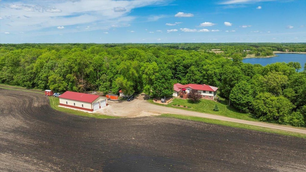 5620 Mill Lake Rd SW, Holmes City Twp, MN 56327 - aerial view of property and surrounding area with a heavily wooded area and a nearby body of water