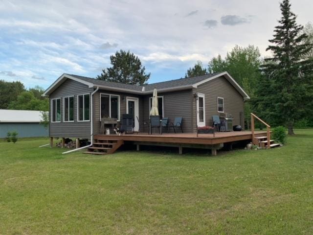 48408 Pillar Rd, Deer River, MN 56631 - back of house with a yard and a deck