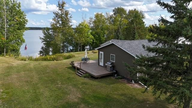 48408 Pillar Rd, Deer River, MN 56631 - view of grassy yard with a deck with water view