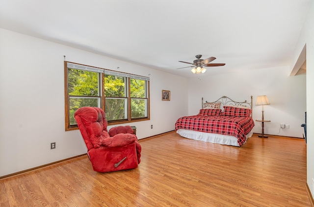 4248 Westview Dr, Shoreview, MN 55126 - bedroom with light wood-style flooring, baseboards, and ceiling fan