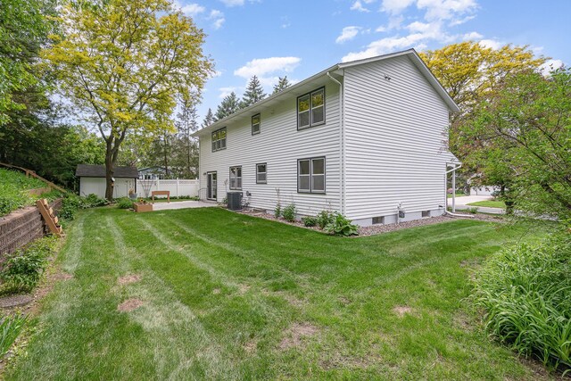 4248 Westview Dr, Shoreview, MN 55126 - rear view of property with central air condition unit and a patio