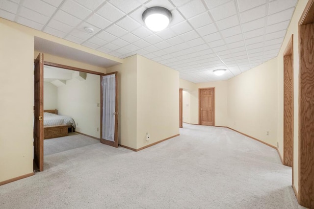 2725 Pilgrim Ln N, Plymouth, MN 55441 - unfurnished room with light colored carpet, a paneled ceiling, and a smoke detector