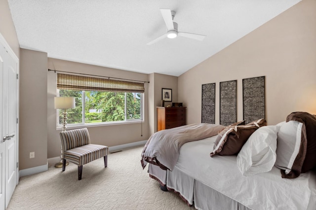 2244 Water Lilly Ln Unit 405, Eagan, MN 55122 - bedroom featuring vaulted ceiling, baseboards, light colored carpet, and a ceiling fan