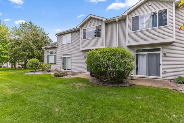 2244 Water Lilly Ln Unit 405, Eagan, MN 55122 - back of property featuring a lawn